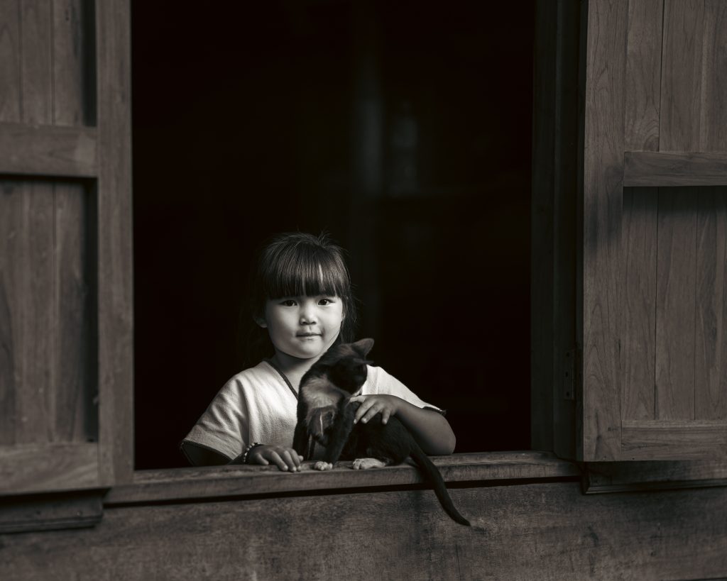 Black-and-white portrait photographed by Atit Siri