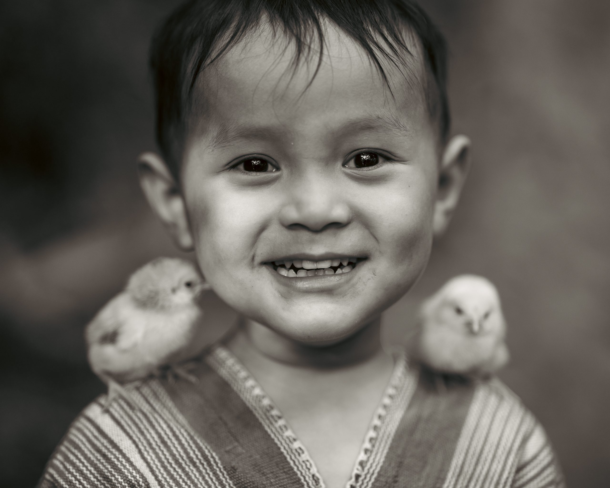 Black-and-white portrait photographed by Atit Siri